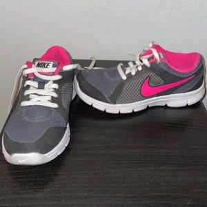 Black and pink running shoes